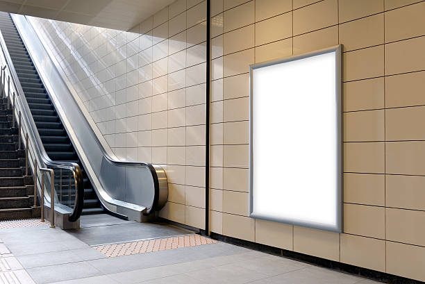 istock Vertical light box poster mockup in metro station. 627782112