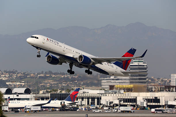 Delta Air Lines Boeing 757-200 airplane Los Angeles International Los Angeles, United States - February 22, 2016: A Delta Air Lines Boeing 757-200 with the registration N695DL taking off from Los Angeles International Airport (LAX) in the USA. Delta Air Lines is an American airline headquartered in Atlanta. boeing 757 stock pictures, royalty-free photos & images