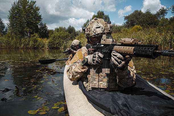 istock Spec ops in the military kayak 627794586