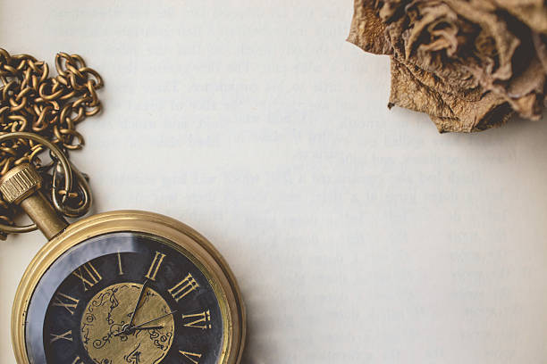 istock Pocket Watch with Dry Rose on Blank Space Old Paper 627799974
