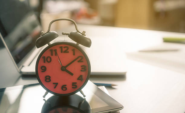 istock alarm clock counting at the end of the day 627806100