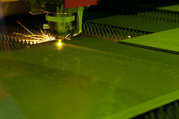 istock The laser cutter machine while cutting the sheet metal 627811208