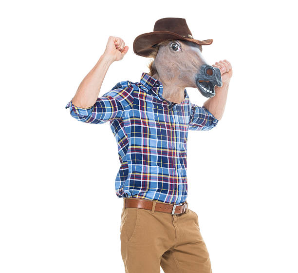 istock Cowboy in horse costume and cheering 627811384