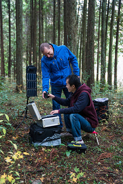istock Researchers working together at a remote solar powered field laboratory 627811988