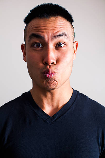 istock Asian Man Making a Kissing Face 627814452