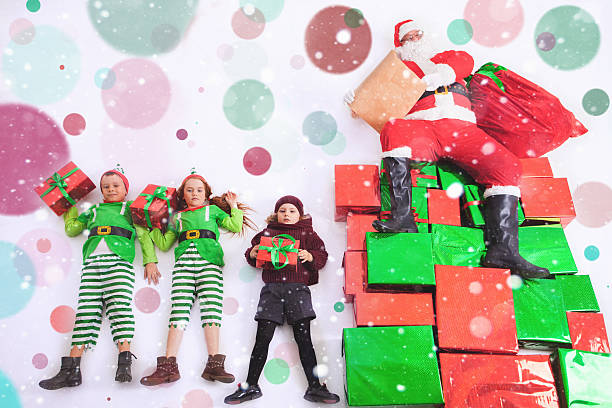istock Santa's helpers working at North Pole. He Reading wishes 627817378