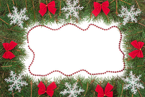 istock Christmas frame made of fir branches decorated with bows and 627817668