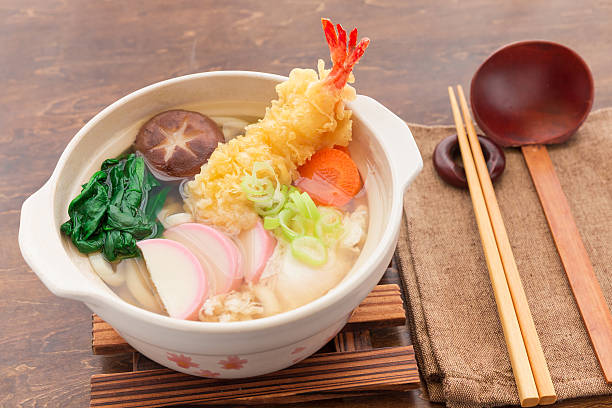 istock nabeyaki udon, japanese hot pot noodle 627832514
