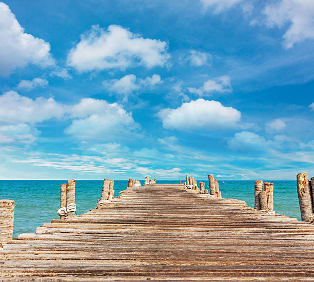 istock Jetty at beauty beach summer season 627839006