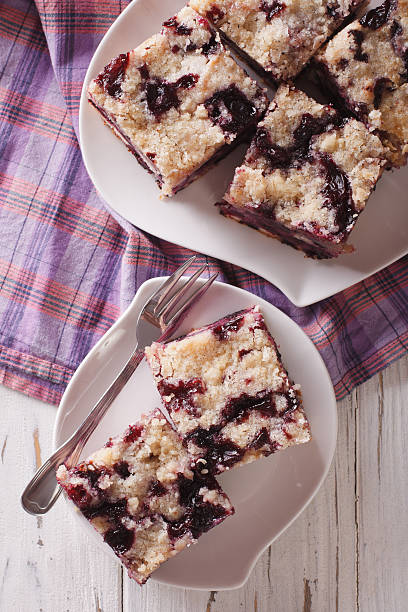 istock Berry Buckle close up on a plate. Vertical top view 627840694