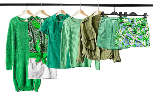 istock Green clothes on clothes racks 627840990