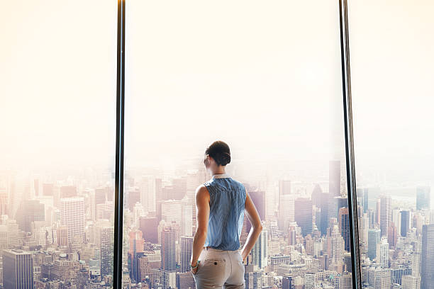 istock Taking a look out over her city 627842332