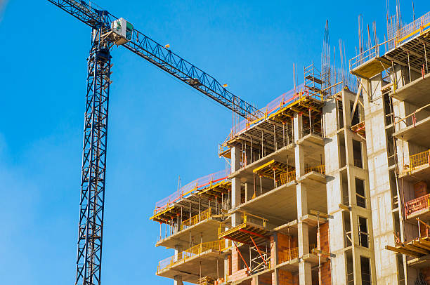 istock Power Plant Construction. Construction site with cranes on sky background 627853572