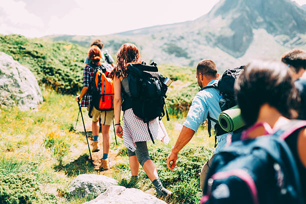 istock Friends hiking in the mountain 627854882