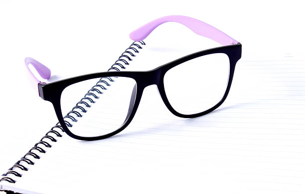 istock Glasses on a book,Close up. 627855990
