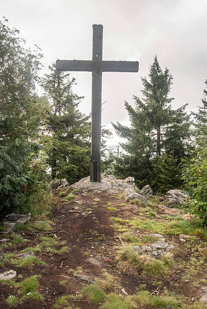 istock Siebensteinkopf hill summit with cross in Bavarian Forest mountains 627856076