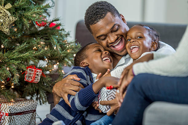 istock Laughing Together on Christmas Morning 627864608