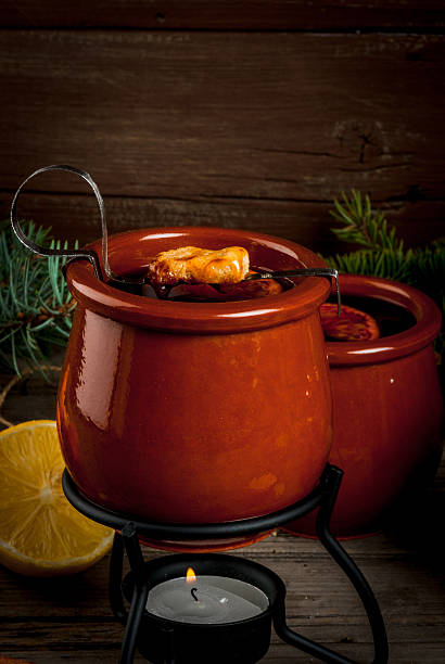 istock Traditional German Christmas drink Feuerzangenbowle 627870018