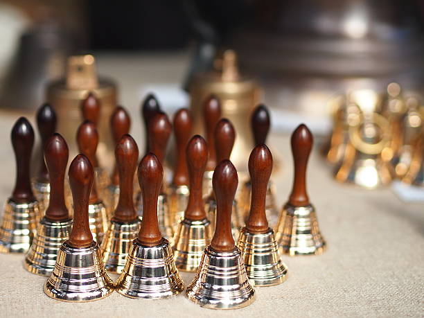istock Collection of small shiny metal bells 627870578