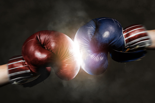 Democrats and Republicans in the campaign symbolized with Boxing Gloves