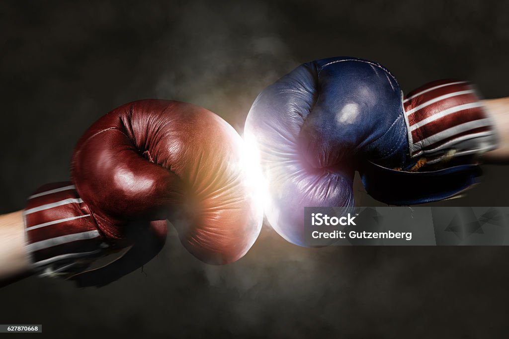 Republicans and Democrats in the campaign symbolized with Boxing Democrats and Republicans in the campaign symbolized with Boxing Gloves Boxing Glove Stock Photo