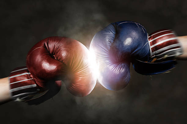 Republicans and Democrats in the campaign symbolized with Boxing Democrats and Republicans in the campaign symbolized with Boxing Gloves midterm election photos stock pictures, royalty-free photos & images