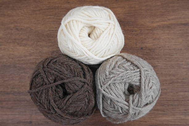 istock Brown, white and beige woolen balls 627870800