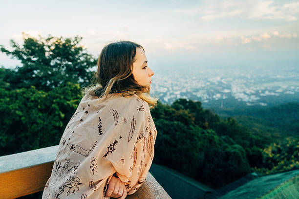 istock Woman looking at scenic view 627872734