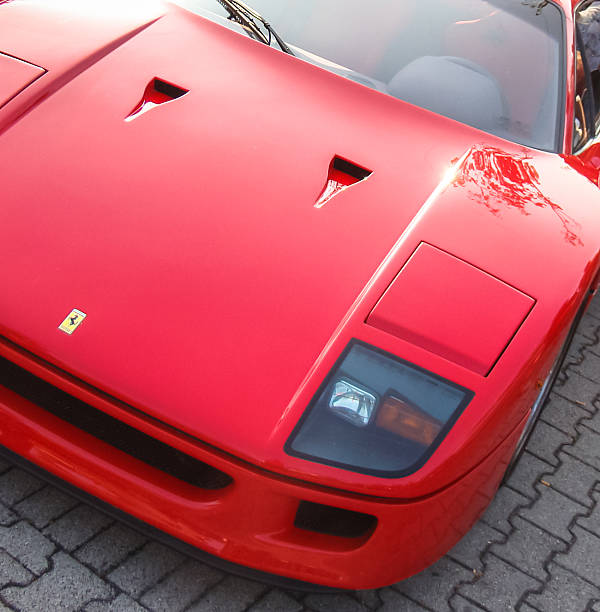 Venezia, Italy - October 12, 2018: Front detail of a red Ferrari F40 supercar parked on a parking in front of supermarket in Mira - Venezia, Italy