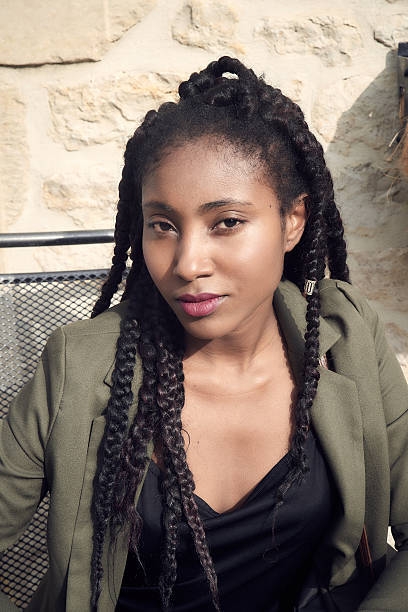 istock Beautiful black woman posing- sitting 627873470