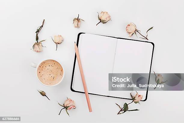 Coffee Empty Notebook Dry Roses Flowers Cozy Breakfast Flat Lay Stock Photo - Download Image Now