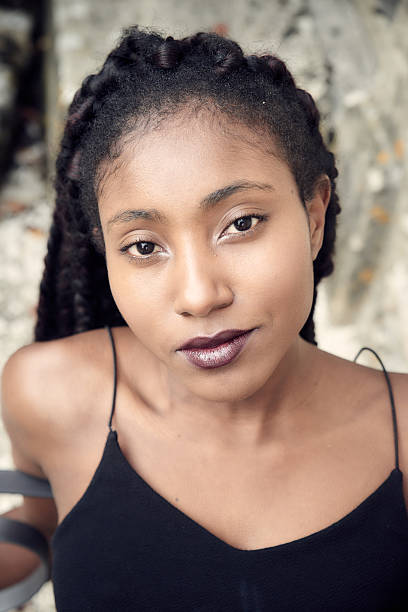 istock Beautiful black woman posing - close up 627887422
