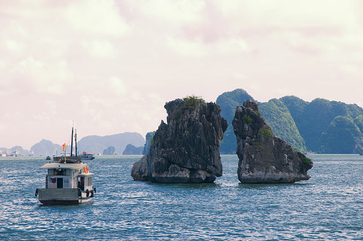 Ha Long Bay, in the Gulf of Tonkin, includes some 1,600 islands and islets, forming a spectacular seascape of limestone pillars. Because of their precipitous nature, most of the islands are uninhabited and unaffected by a human presence. The site's outstanding scenic beauty is complemented by its great biological interest.