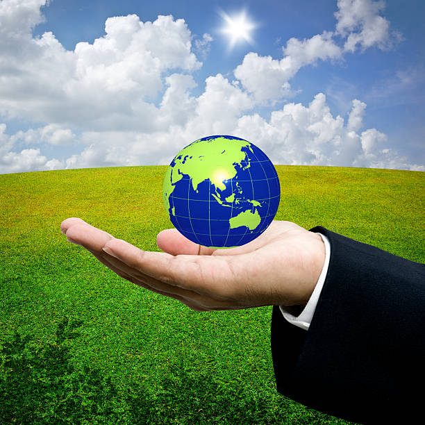 istock Save the earth concept, The earth in hand 627903526