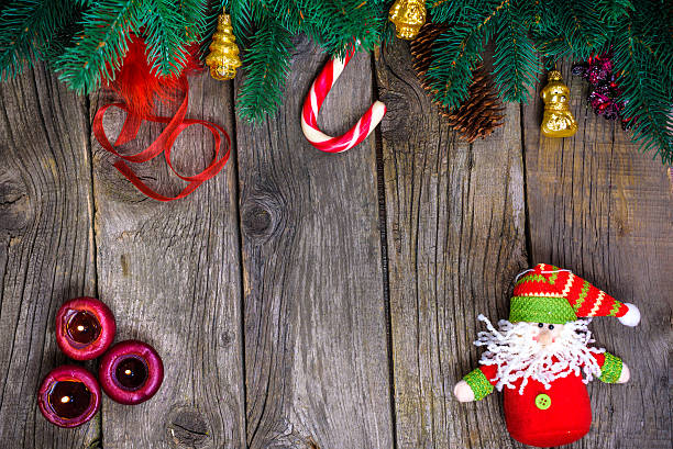 istock Christmas wooden background with snow fir tree. View copy space 627904302