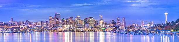 istock panorama of Seattle cityscape at night with reflection,Washington. 627906428