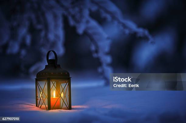 Candle Lantern In Snow Stock Photo - Download Image Now - Christmas, Lantern, Winter