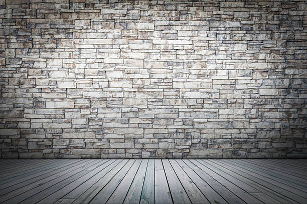 istock white wood floor and white brick wall texture for background. 627908328