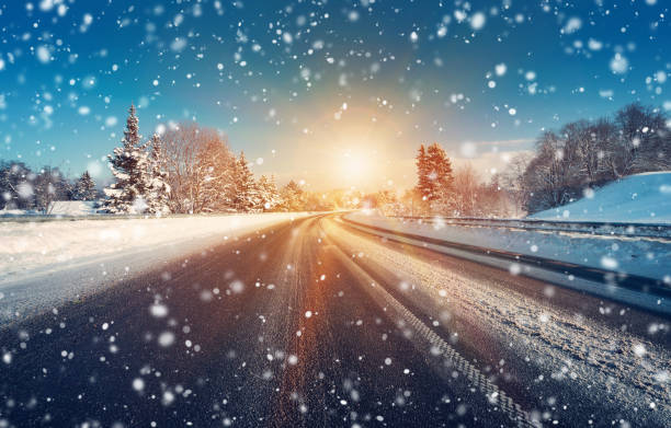 istock Car on winter road 627908390