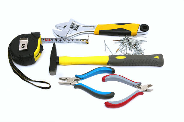 istock Construction tools - hammer, nail, pliers,tape measure 627908776