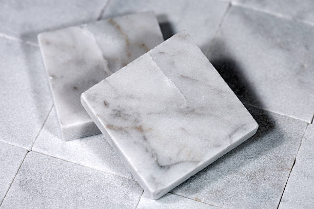 istock Square Tiles of White Carrara Marble 627909100