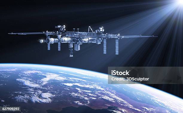 International Space Station In The Rays Of Sun Stock Photo - Download Image Now - International Space Station, Astronaut, Planet Earth