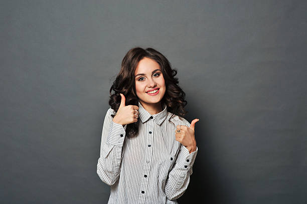 istock Beautiful woman red lips fly hair 627909516