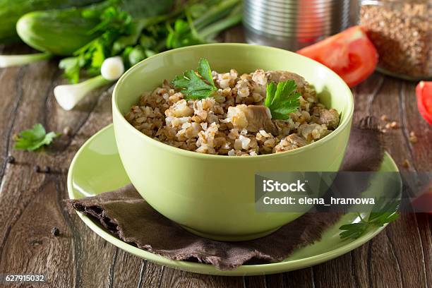 Buckwheat With Meat Goulash On A Stone Background Stock Photo - Download Image Now - Autumn, Backgrounds, Barley