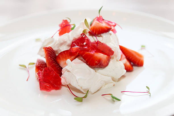 istock Meringue dessert with strawberries and jam 627915098