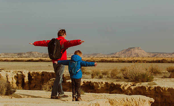 istock father and son travel in scenic mountains 627917286