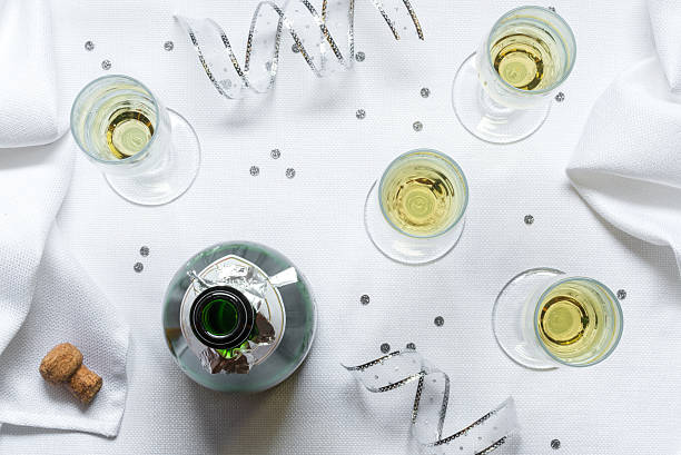 istock Bubbly and Four Champagne Flutes 627923156