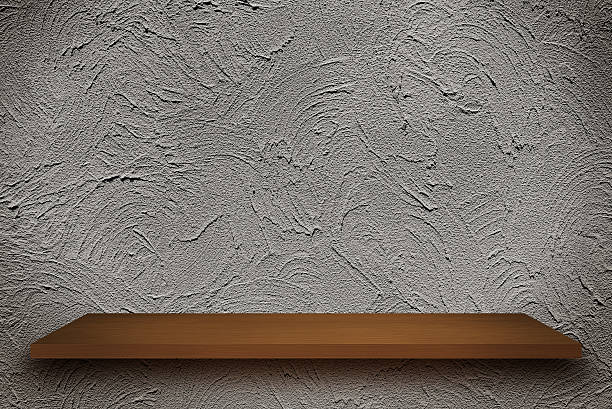 istock Empty top of wooden shelves on rough wall  background 627923612