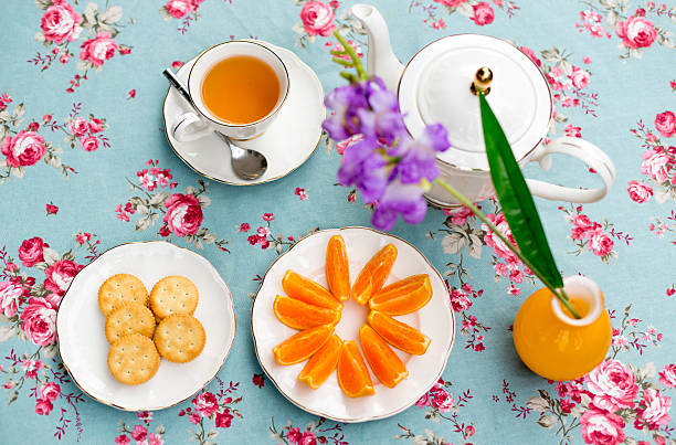istock Selected focus top view English tea with orange fruit 627930062