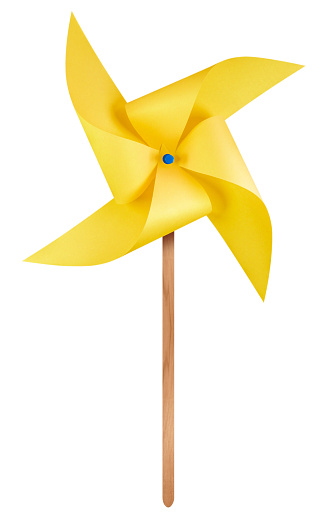 Yellow paper windmill pinwheel isolated on white with Clipping Path